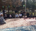 برگزاری  مراسم قرائت زیارت پر فیض عاشورا در جوار مزار شهید خوش همزمان با سومین روز از هفته جنگ