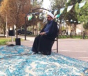برگزاری  مراسم قرائت زیارت پر فیض عاشورا در جوار مزار شهید خوش همزمان با سومین روز از هفته جنگ