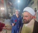 تبریک و اهدای شاخه گل توسط رئیس دانشکدگان فارابی دانشگاه تهران به کارگران زحمتکش در روز گرامیداشت روز کار و کارگر