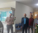 تبریک و اهدای شاخه گل توسط رئیس دانشکدگان فارابی دانشگاه تهران به استادان و همیاران آموزشی در روز گرامیداشت روز معلم و مقام استاد