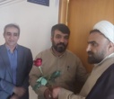 تبریک و اهدای شاخه گل توسط رئیس دانشکدگان فارابی دانشگاه تهران به استادان و همیاران آموزشی در روز گرامیداشت روز معلم و مقام استاد