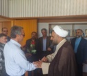 تبریک و اهدای شاخه گل توسط رئیس دانشکدگان فارابی دانشگاه تهران به استادان و همیاران آموزشی در روز گرامیداشت روز معلم و مقام استاد